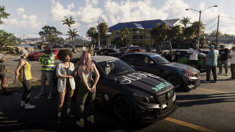 Lucia standing around cars in streets