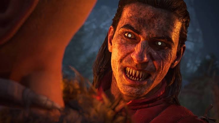 A guy with vampire teeths looking aggresively
